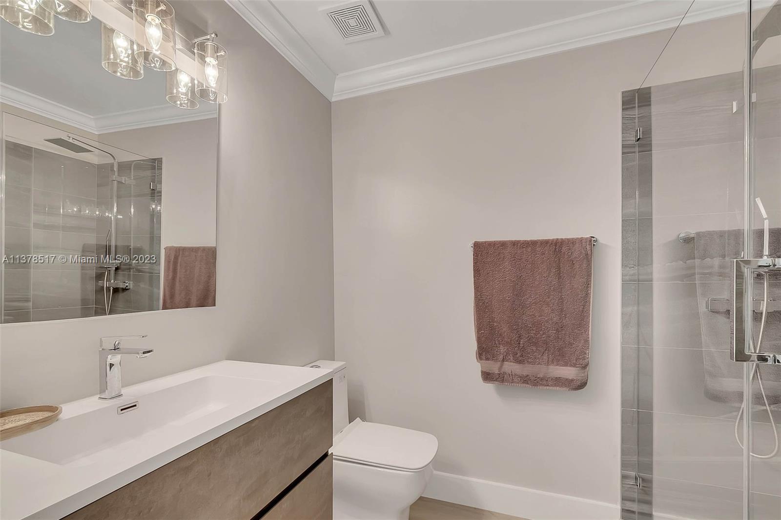 4115 Sabal Ridge Circle Weston, FL 33331 - Photo 21 of 31 a bathroom with a sink a toilet and shower