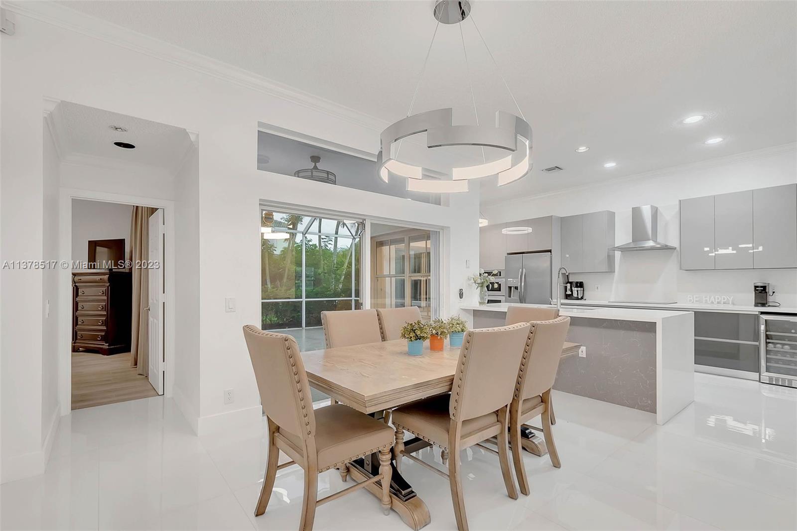 4115 Sabal Ridge Circle Weston, FL 33331 - Photo 6 of 31 a view of a dining room with furniture window and outside view
