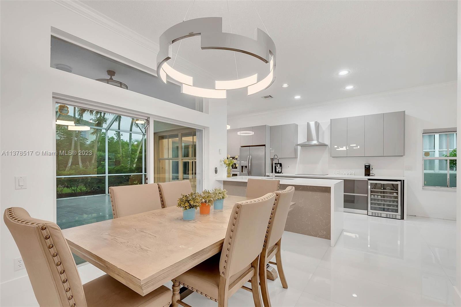4115 Sabal Ridge Circle Weston, FL 33331 - Photo 7 of 31 a view of a dining room with furniture window and outside view