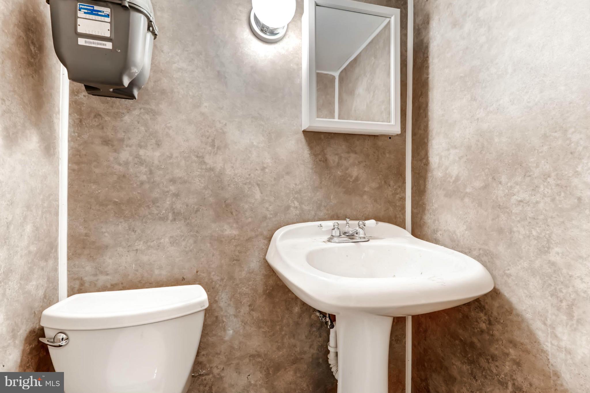 7396 Edsworth Road Baltimore, MD 21222 - Photo 14 of 17 Updated Lower Level 1/2 Bathroom