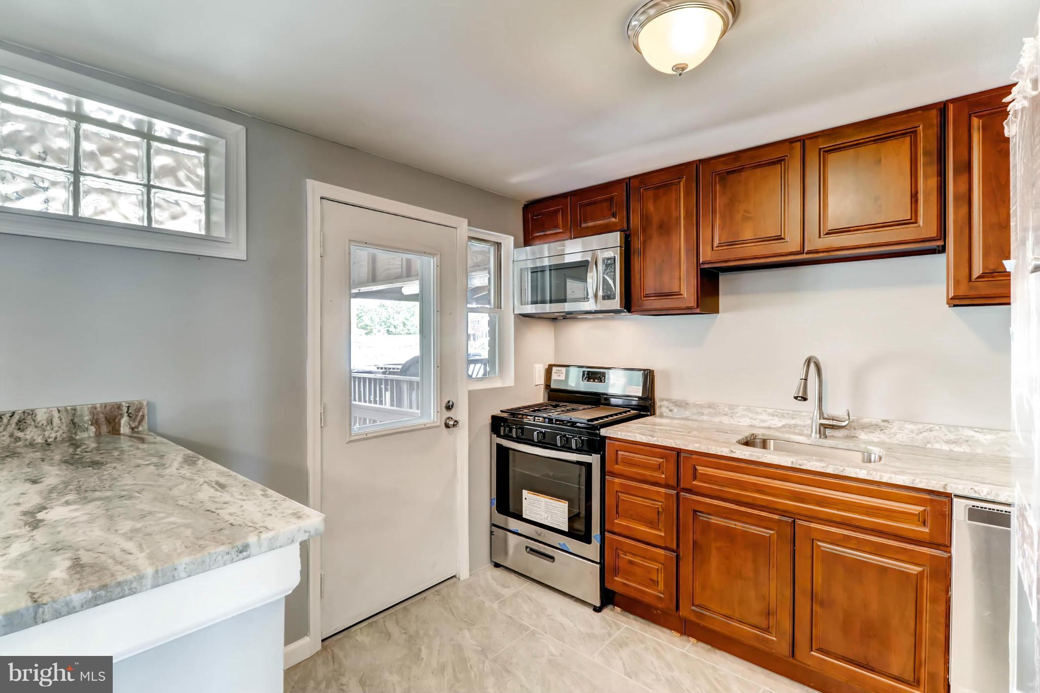 7396 Edsworth Road Baltimore, MD 21222 - Photo 8 of 17 Updated Kitchen w/ ss appliances