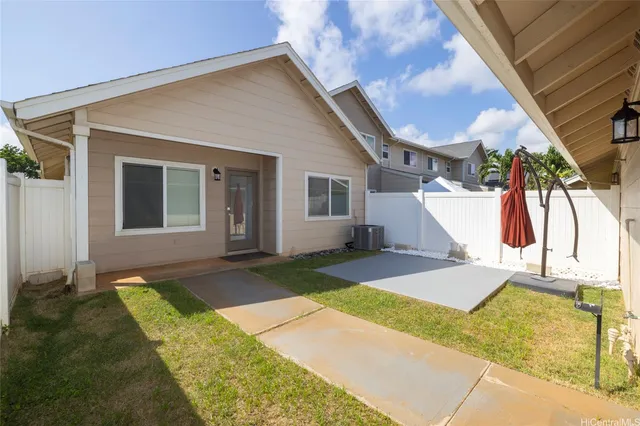 a house view with a backyard space