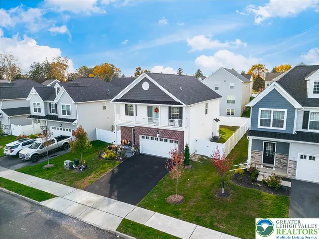 a aerial view of a house with garden