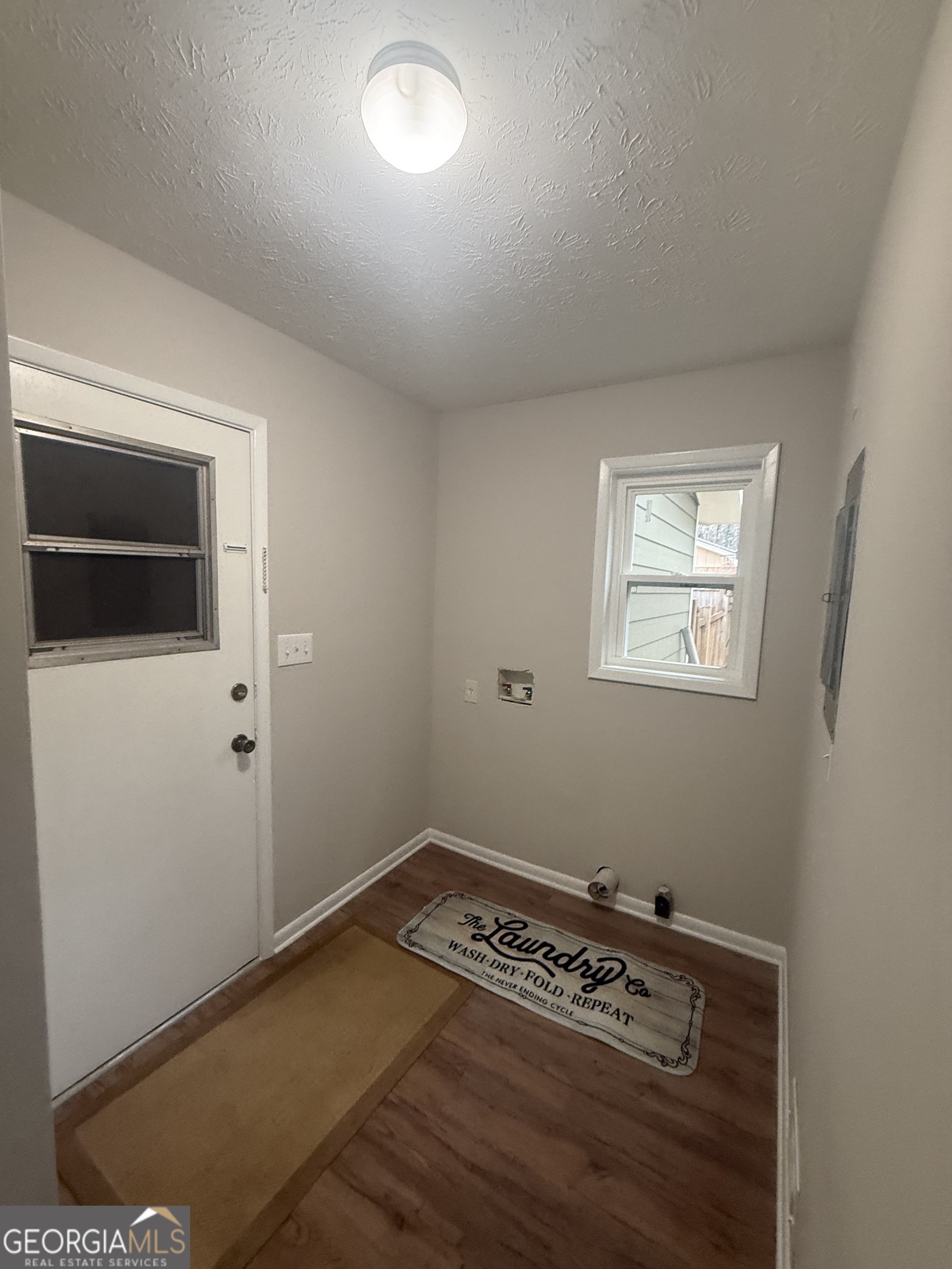 152 Club Circle Stockbridge, GA 30281 - Photo 16 of 17 a room with storage and utility