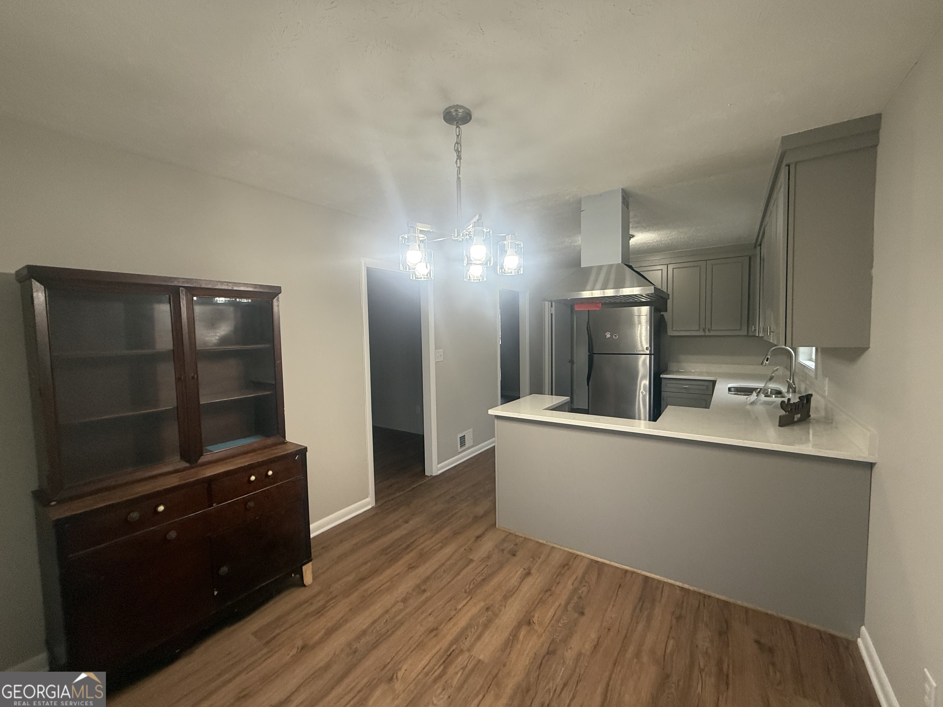 152 Club Circle Stockbridge, GA 30281 - Photo 6 of 17 a living room with furniture and wooden floor