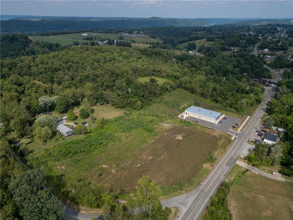 0 Dry Run Road Monongahela, PA 15063 - Photo 4 of 9 an aerial view of residential houses with outdoor space and trees