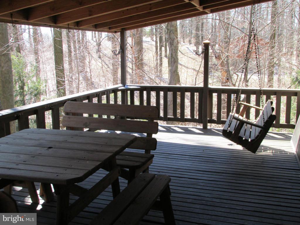 1161 Cider Press Road Manheim, PA 17545 - Photo 12 of 56 a view of deck with wooden floor and outdoor seating