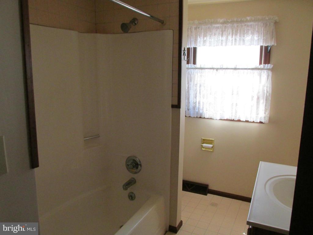 1161 Cider Press Road Manheim, PA 17545 - Photo 20 of 56 a bathroom with a bathtub and a shower
