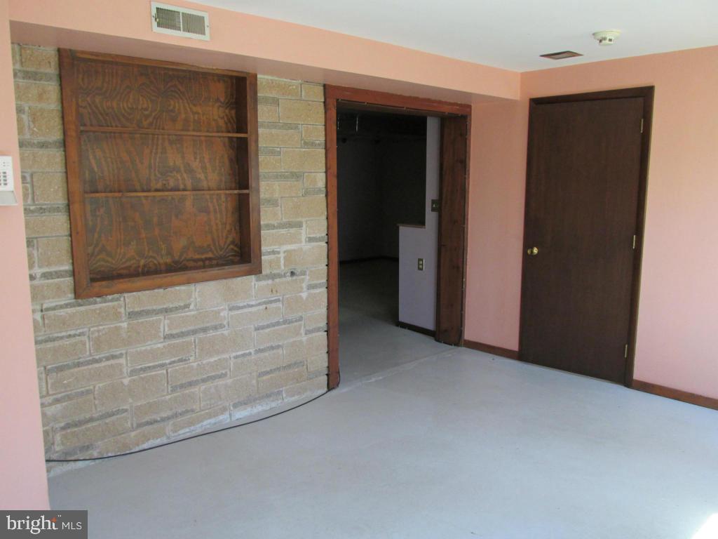 1161 Cider Press Road Manheim, PA 17545 - Photo 36 of 56 a view of an empty room and fire place