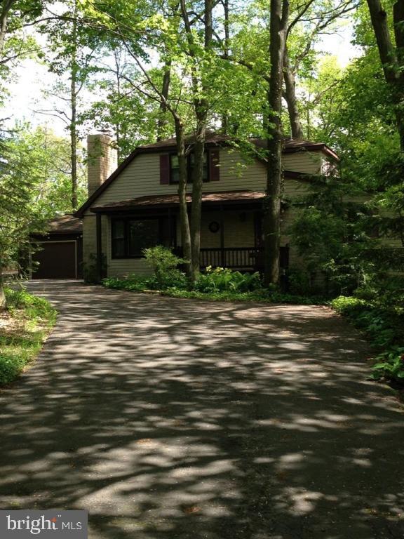 1161 Cider Press Road Manheim, PA 17545 - Photo 54 of 56 a front view of a house with a garden
