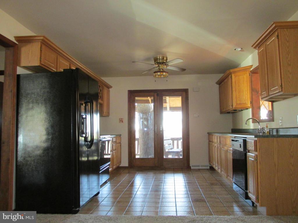 1161 Cider Press Road Manheim, PA 17545 - Photo 8 of 56 a view of a kitchen with a sink and dishwasher cabinets