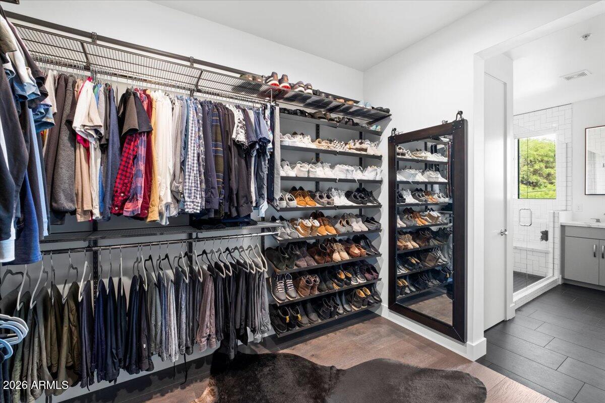 4331 North 27th Place Phoenix, AZ 85016 - Photo 16 of 33 a view of walk in closet with clothes and shoes