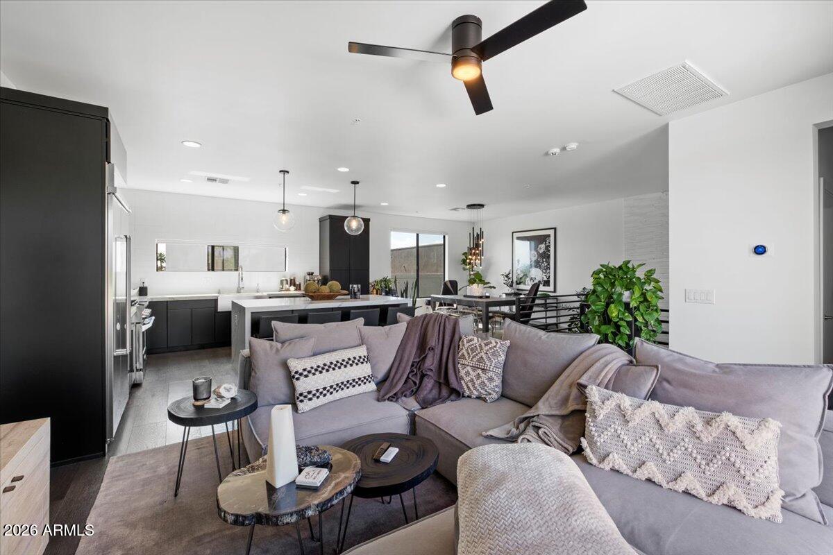 4331 North 27th Place Phoenix, AZ 85016 - Photo 5 of 33 a living room with furniture kitchen view and a couch