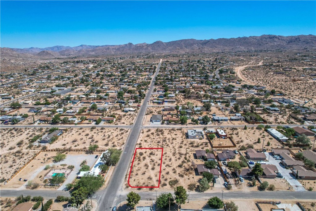 6650 Hillview Road Joshua Tree, CA 92252 - Photo 2 of 7 an aerial view of residential house and sandy dunes