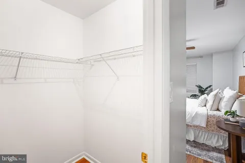 a bathroom with a sink a toilet and shower curtain