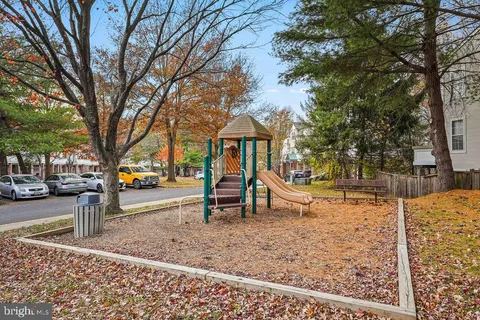 a view of a city street with house