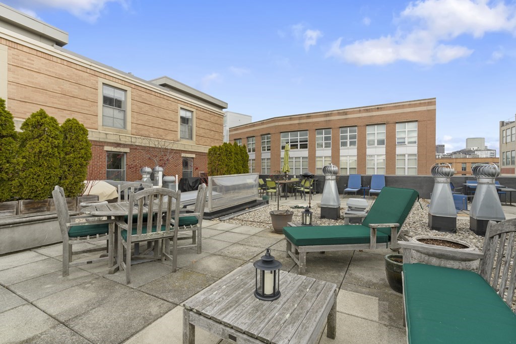 15 Savoy Street, Unit D309 Boston, MA 02118 - Photo 29 of 31 a building outdoor space view with a sitting space