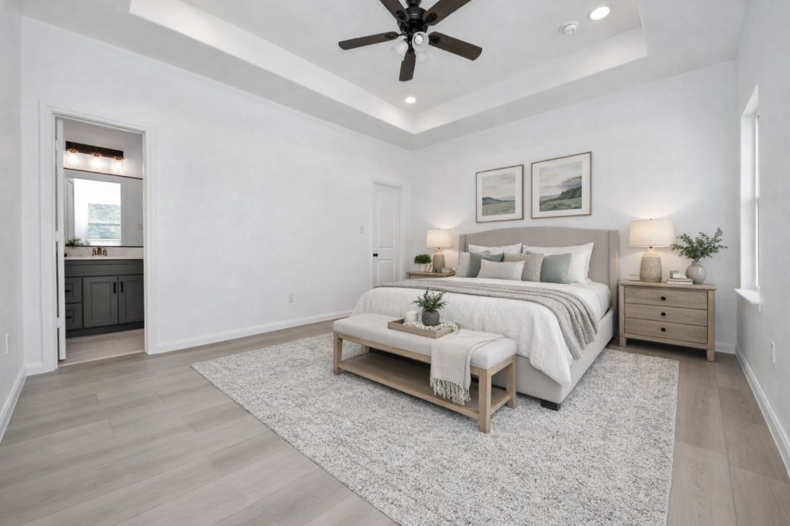 8653 Sunderland Road Houston, TX 77028 - Photo 5 of 14 a bedroom with a bed and a chandelier