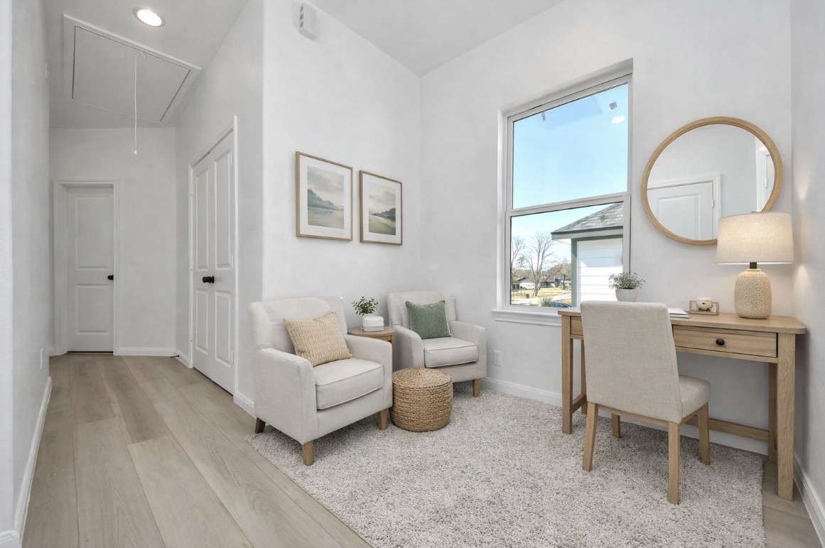 8653 Sunderland Road Houston, TX 77028 - Photo 8 of 14 a living room with furniture a mirror and a bathroom