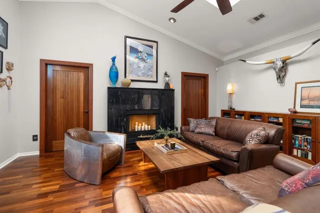 a very nice looking room with furniture and a large window