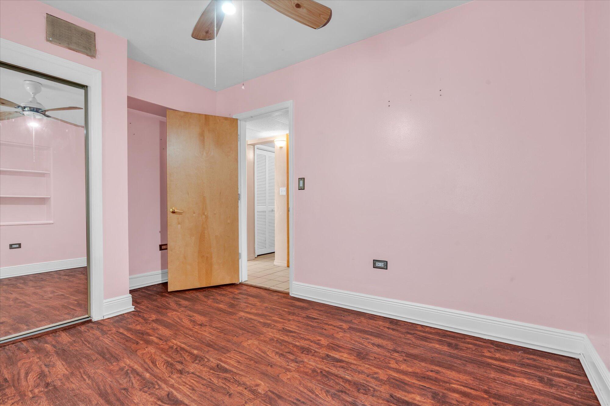 7984 Tuna Drive Marathon, FL 33050 - Photo 17 of 40 a view of empty room with wooden floor