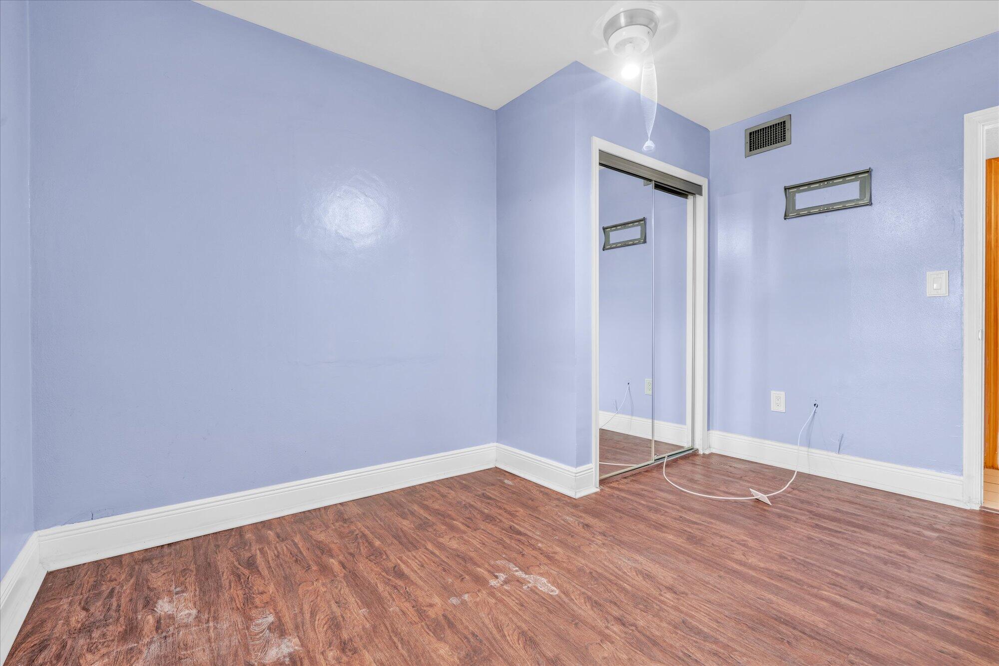 7984 Tuna Drive Marathon, FL 33050 - Photo 19 of 40 a view of empty room with wooden floor