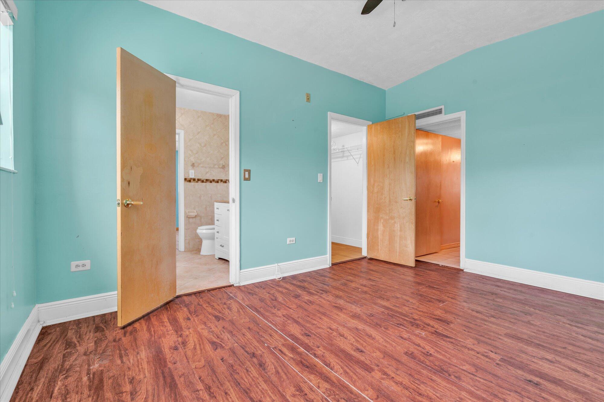 7984 Tuna Drive Marathon, FL 33050 - Photo 21 of 40 a view of an empty room with wooden floor