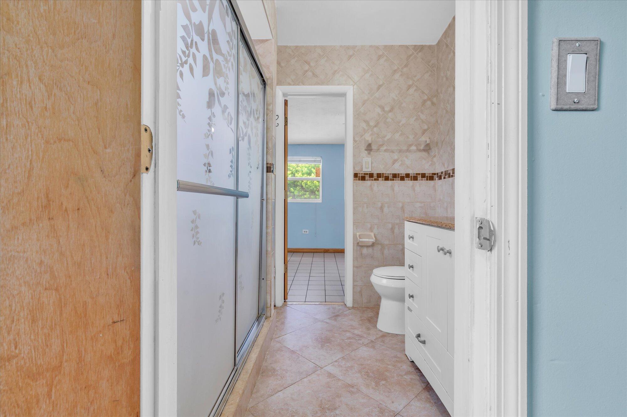 7984 Tuna Drive Marathon, FL 33050 - Photo 24 of 40 a bathroom with a toilet and a shower