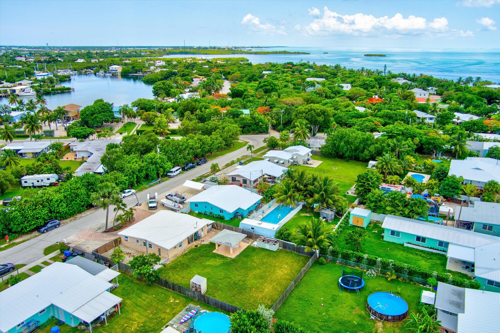 7984 Tuna Drive Marathon, FL 33050 - Photo 3 of 40 a view of yard with swimming pool
