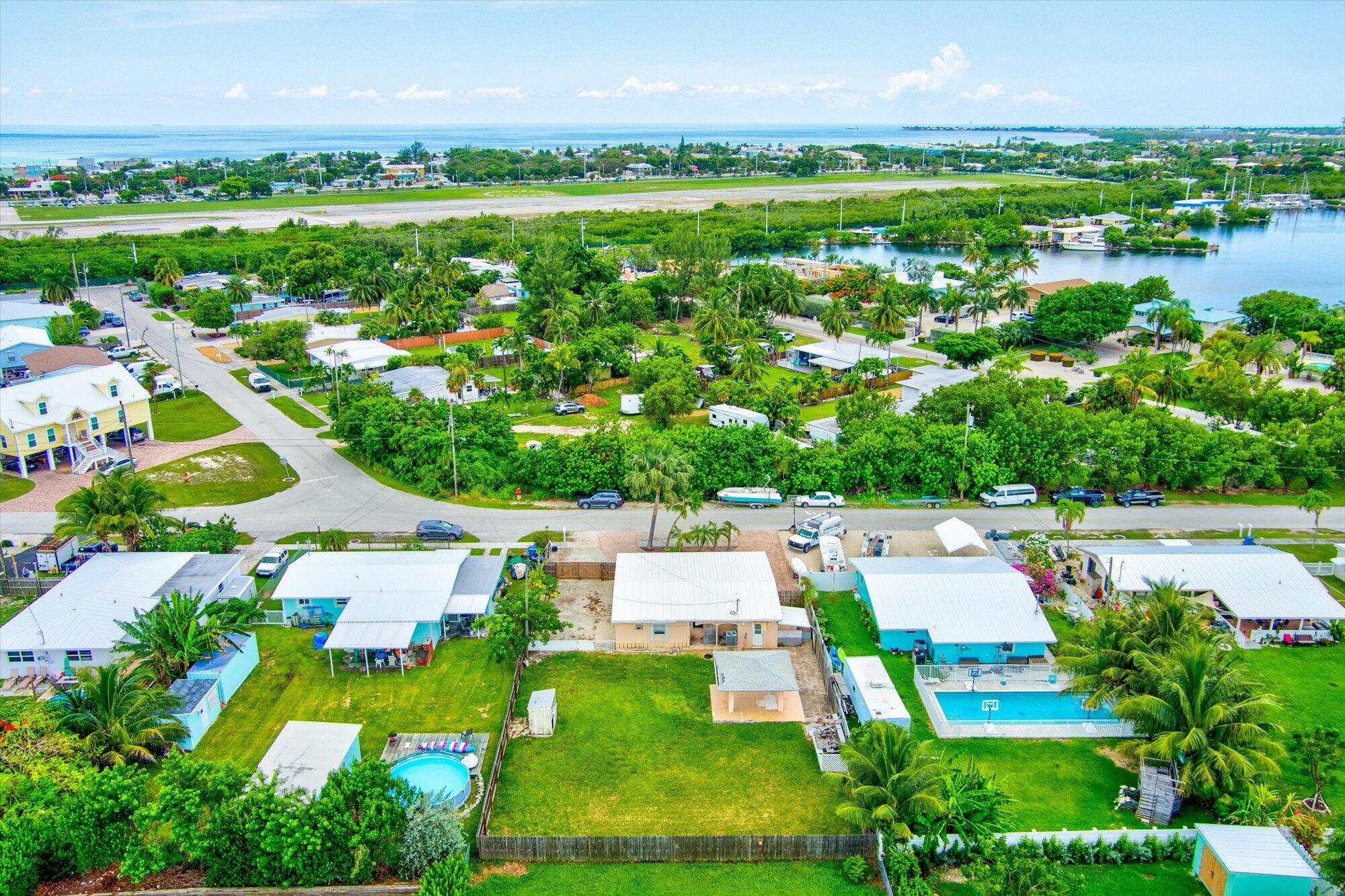 7984 Tuna Drive Marathon, FL 33050 - Photo 35 of 40 an aerial view of residential houses with outdoor space and swimming pool