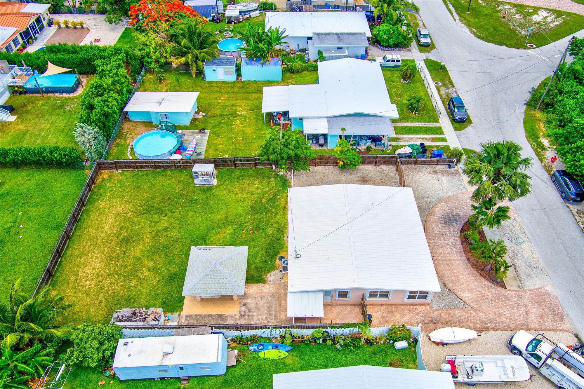 7984 Tuna Drive Marathon, FL 33050 - Photo 38 of 40 an aerial view of multiple houses with swimming pool