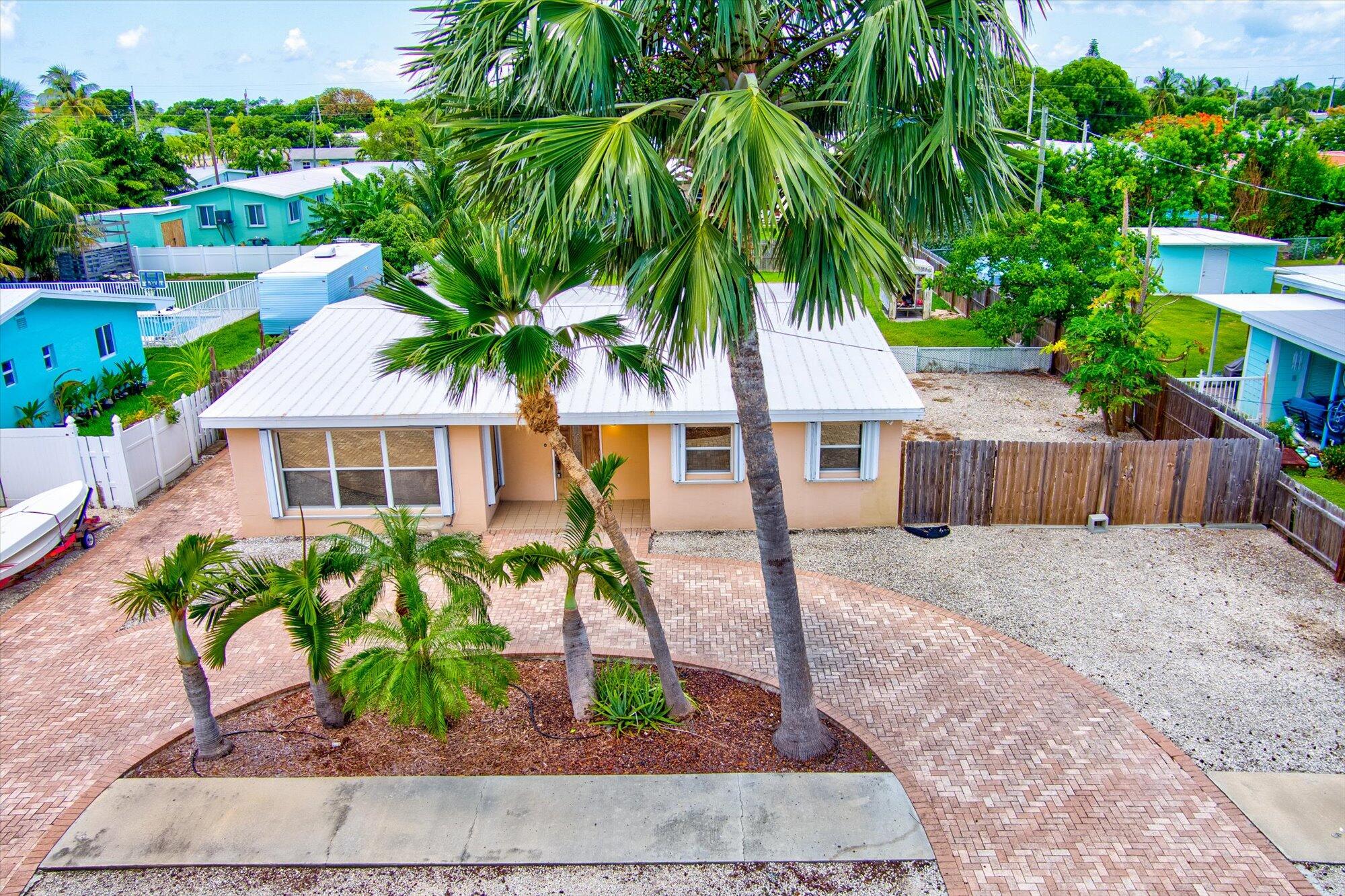 7984 Tuna Drive Marathon, FL 33050 - Photo 40 of 40 a front view of a house with garden