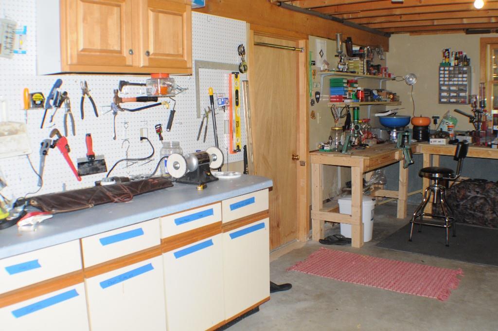 372 Alewive Road Kennebunk, ME 04043 - Photo 26 of 34 Basement workroom with a walkout to...