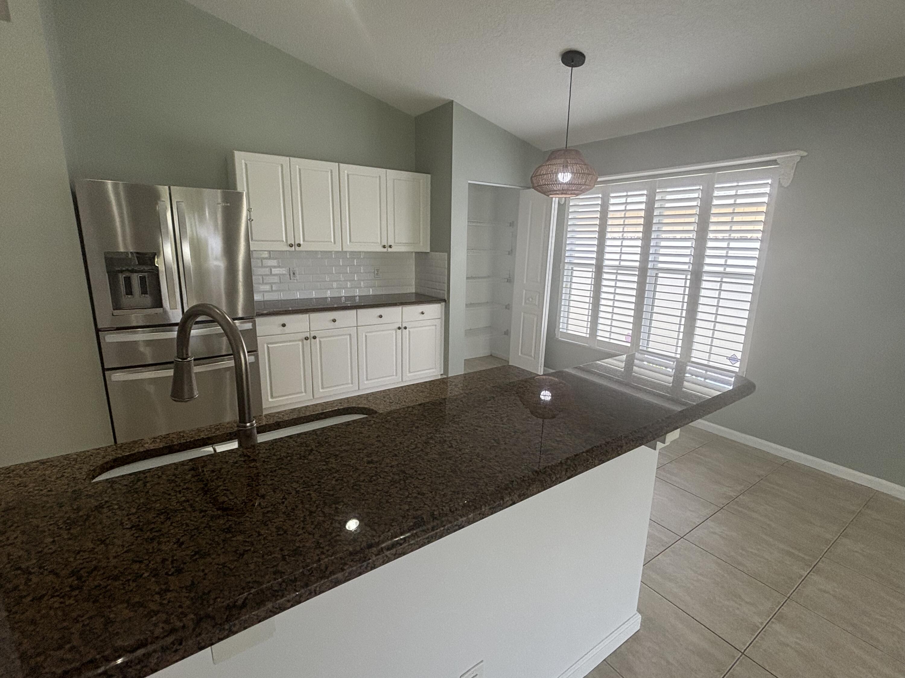 6366 Barbara Street Jupiter, FL 33458 - Photo 7 of 18 IMG_7801