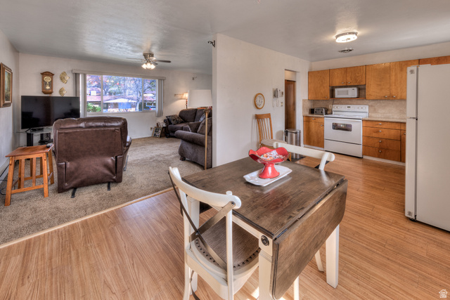 738 Locust Lane Moab, UT 84532 - Photo 7 of 25 Dining area with light wood-style flooring and a ceiling fan