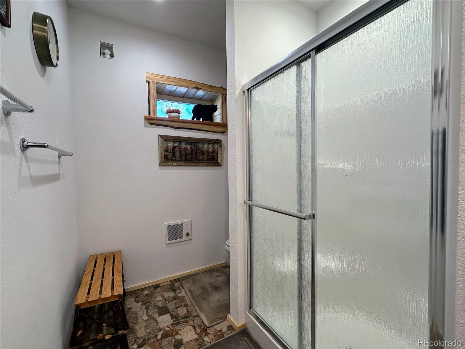 2945 Forbes Park Road Fort Garland, CO 81133 - Photo 20 of 36 a bathroom with a shower and a sink