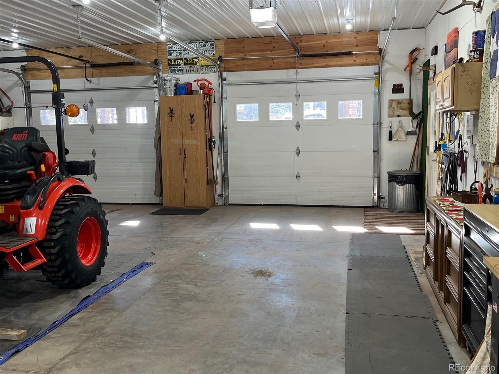 2945 Forbes Park Road Fort Garland, CO 81133 - Photo 24 of 36 a view of a garage with storage