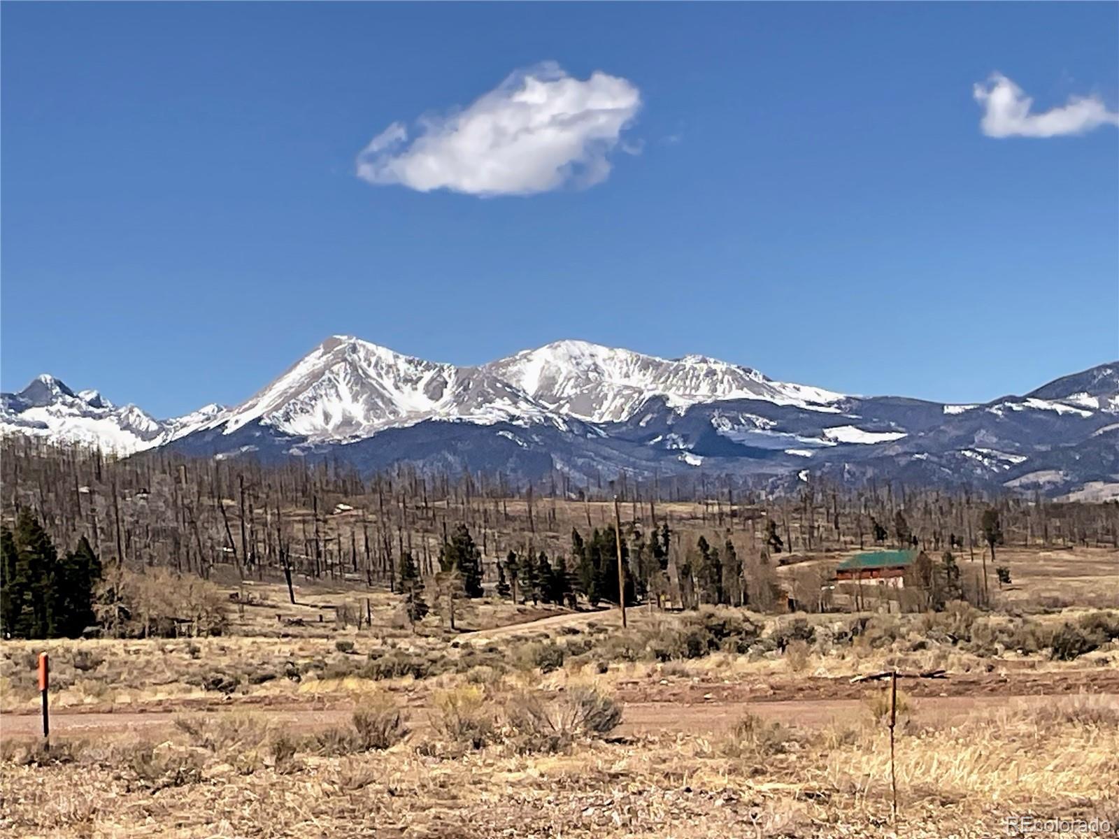 2945 Forbes Park Road Fort Garland, CO 81133 - Photo 33 of 36 a view of a house with a yard covered in snow