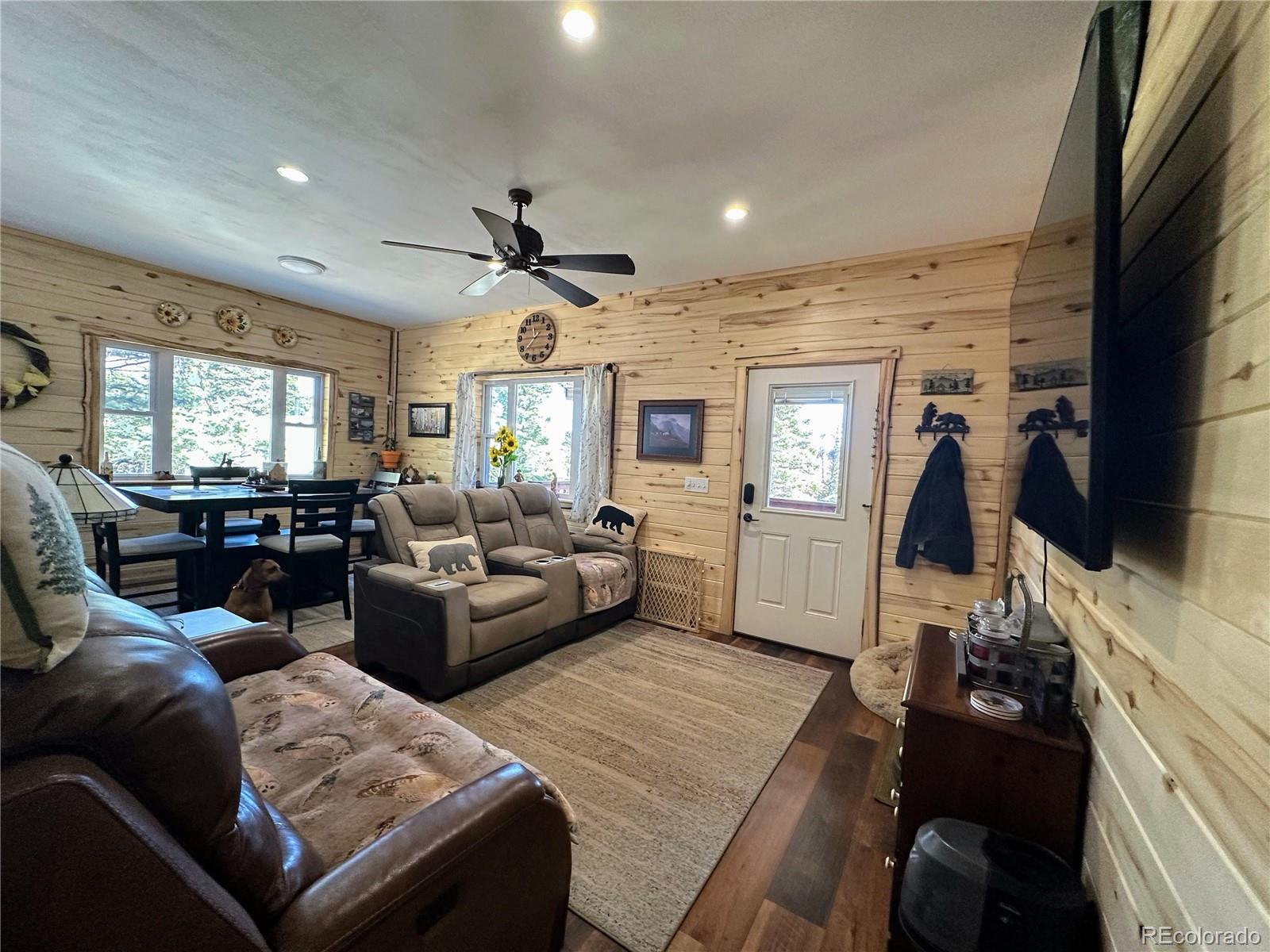 2945 Forbes Park Road Fort Garland, CO 81133 - Photo 7 of 36 a living room with furniture and a flat screen tv