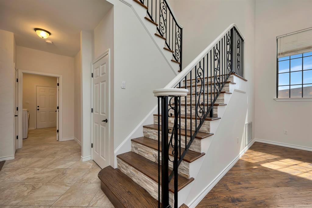 5520 White Settlement Road Weatherford, TX 76087 - Photo 36 of 40 a view of entryway and hall with wooden floor