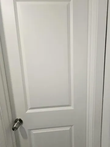 a view of a room with racks on the wall