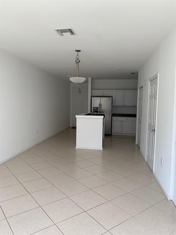 6366 Landings Way, Unit 6366 Tamarac, FL 33321 - Photo 9 of 19 a view of storage and utility room