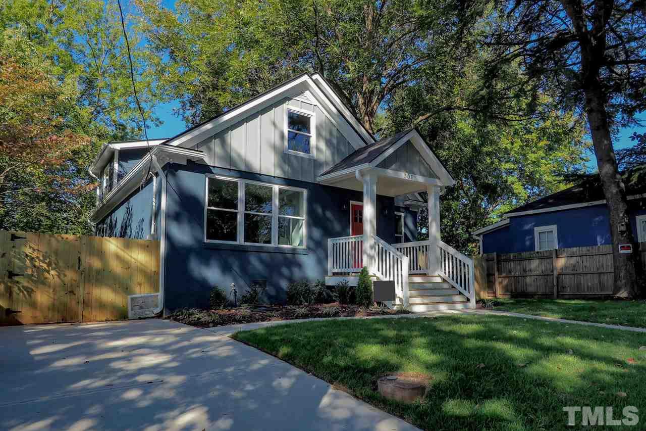 306 Freeman Street Raleigh, NC 27601 - Photo 3 of 25 a front view of a house with a yard