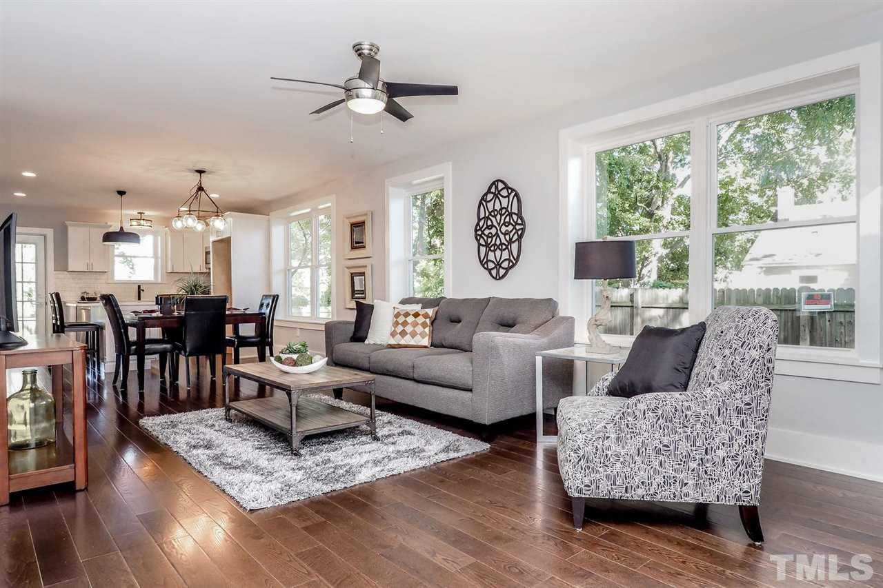 306 Freeman Street Raleigh, NC 27601 - Photo 4 of 25 a living room with furniture and wooden floor
