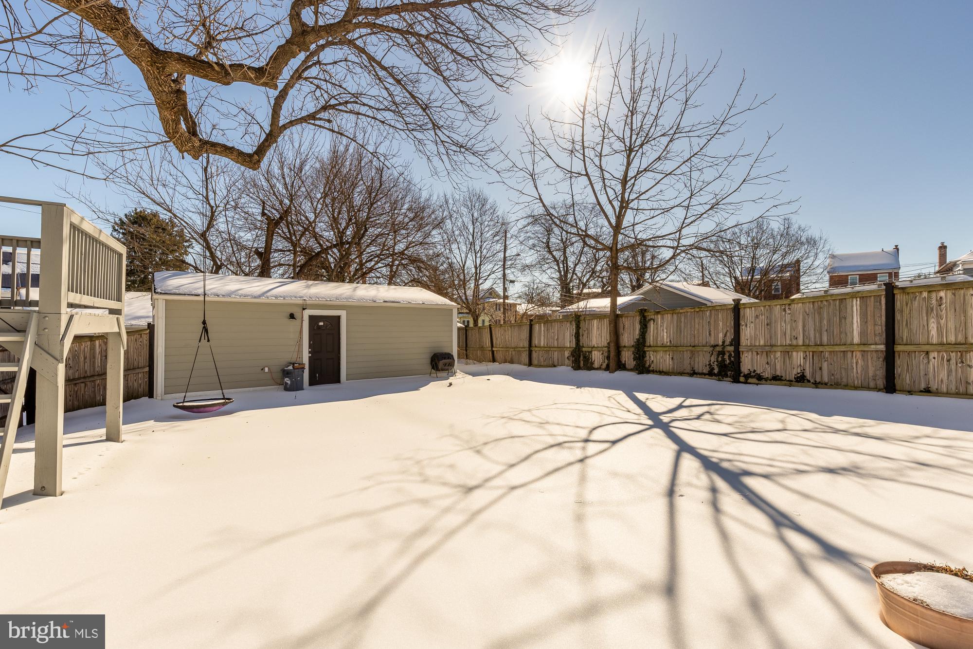 6519 Piney Branch Road Northwest Washington, DC 20012 - Photo 18 of 47 a view of a house with snow on the road
