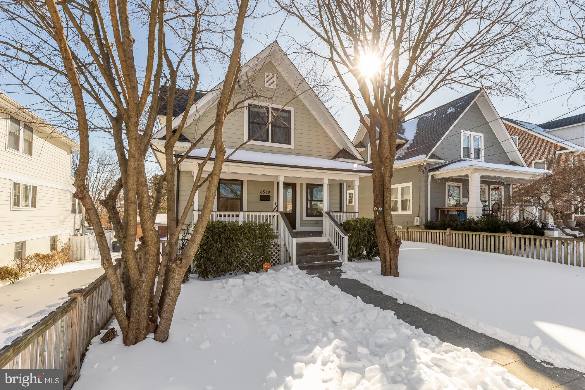6519 Piney Branch Road Northwest Washington, DC 20012 - Photo 2 of 47 a front view of a house with yard and green space