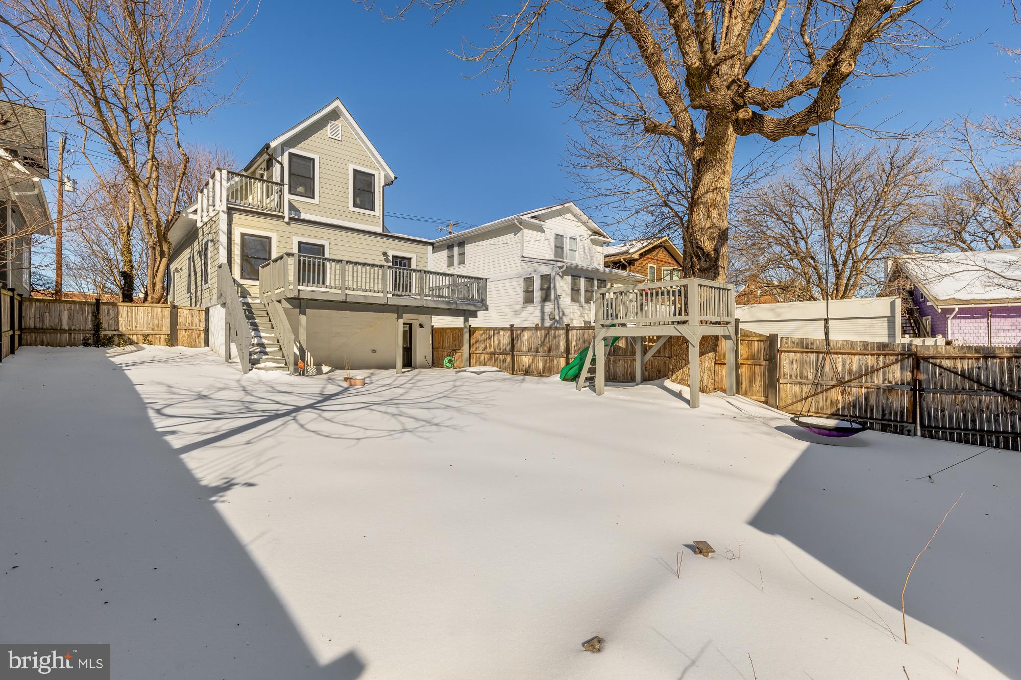 6519 Piney Branch Road Northwest Washington, DC 20012 - Photo 44 of 47 a view of a house with a snow in the yard