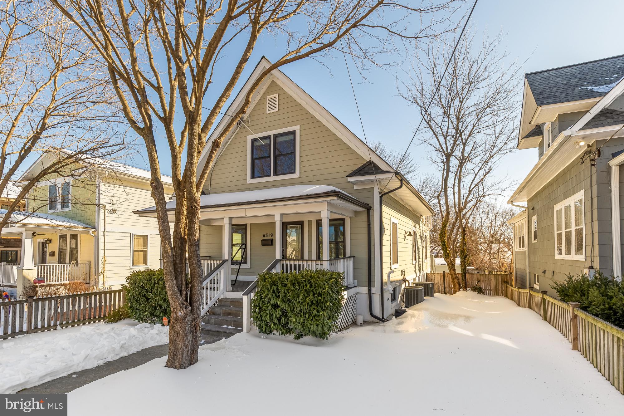 6519 Piney Branch Road Northwest Washington, DC 20012 - Photo 46 of 47 a front view of a house with a garden
