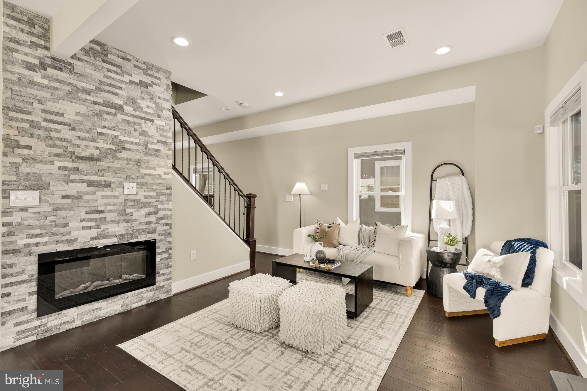 6519 Piney Branch Road Northwest Washington, DC 20012 - Photo 5 of 47 a living room with furniture and a fireplace