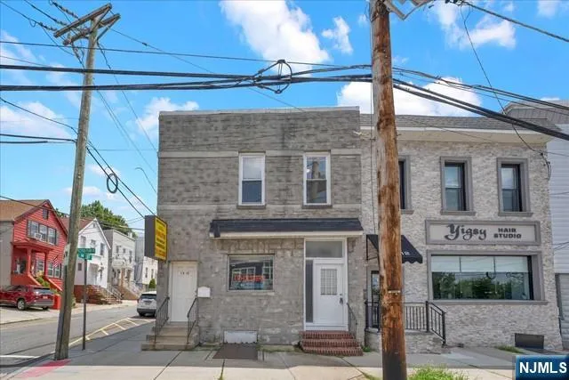a front view of a building with street